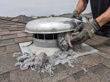 Cleaning Dryer Vent On Roof in Pico Rivera